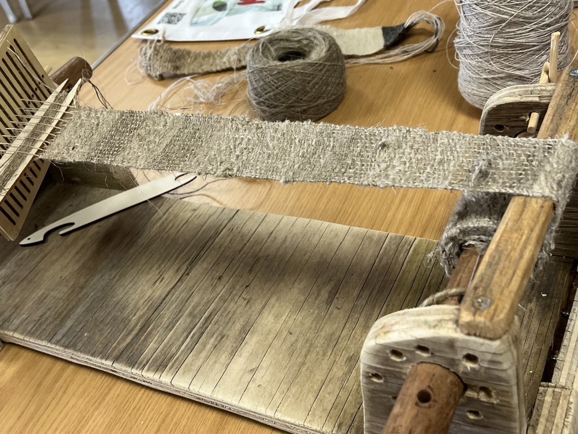 Detail of a handmade small tabletop traditional weaving loom 
