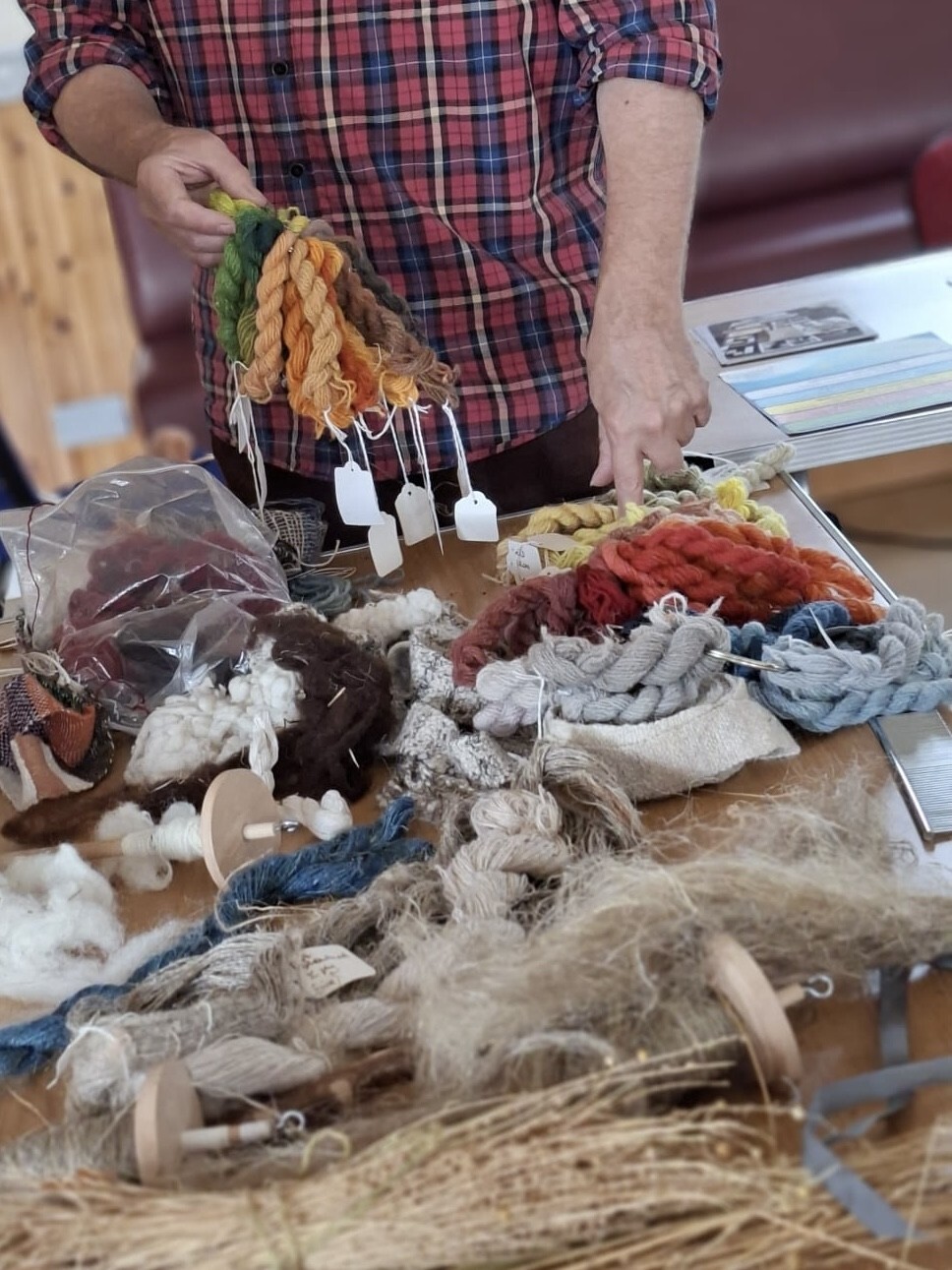 yarns and textiles samples on a table